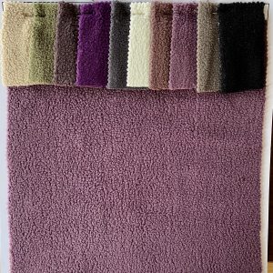 Fake Ollie Fleece Polyester Fresh Fabric For Winter Clothing插图